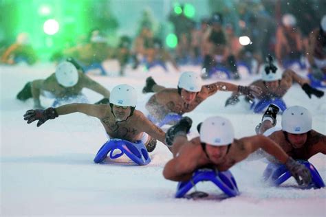 Nearly Naked Sledding In Germany Draws Crowd