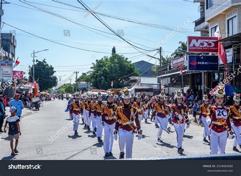 high school students marching  city street   images