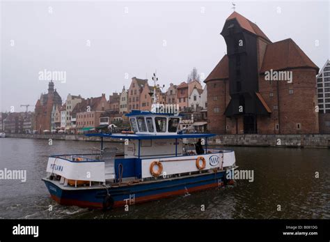 Passenger Ferry Crossing The Stara River Motlawa In Gdansk Danzig