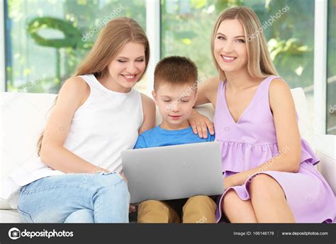 Lesbian Couple With Foster Son Stock Photo Belchonock
