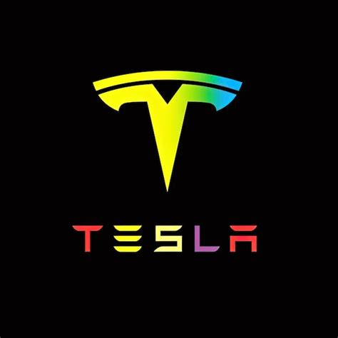 Premium Photo The Tesla Logo On A Black Background