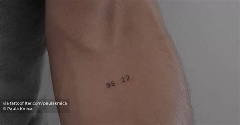 Small Delicate Numbers Tattooed On The Inner Forearm