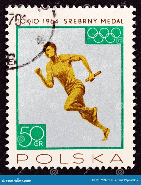 POLAND CIRCA 1965 A Stamp Printed In Poland Shows 4x100m Relay Men