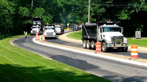 Dump Trucks Delivering Asfalt For Paving Job YouTube