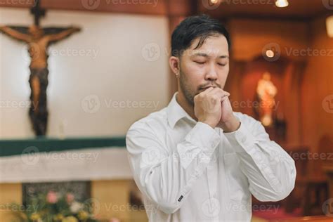 Christian man praying for god blessing. 12168372 Stock Photo at Vecteezy