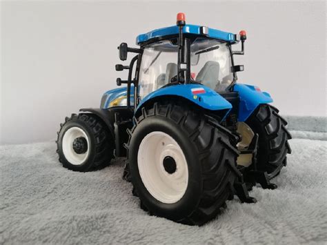 Traktor New Holland T7060 1 32 Britains pasuj Siku Wrocław Kup