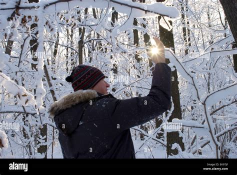 Man Holding A Sun In His Hands Against The Sky Stock Photo Alamy