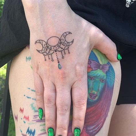 Triple Moon Goddess jeweled design. #nationaltattooday #inkedgirls #tattoo | Hand tattoos ...