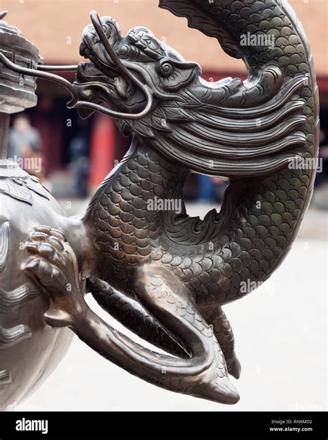 Dragon sculpture in a temple in Hanoi, Vietnam Stock Photo - Alamy