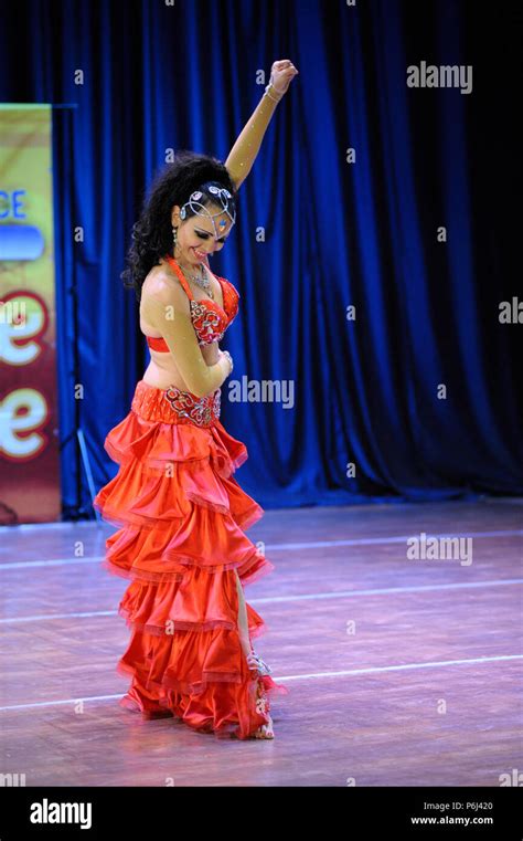 Dancer In A Native Dresses Performing Oriental Dance On Stage Festival