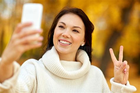 Woman Taking Selfie By Smartphone At Autumn Park Stock Image Image Of