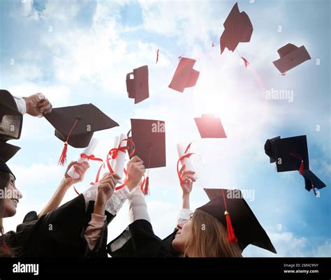 Graduation Cap Throwing Hands Hi Res Stock Photography And Images Alamy