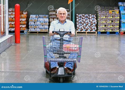 Elderly Man Drives Motorized Wheelchair Stock Photo Image Of Cart