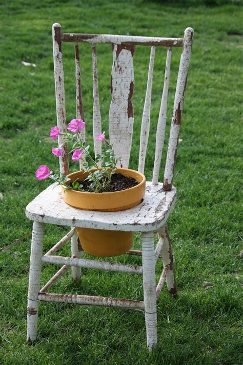 Old Chair As Flower Pot Holder Flower Pot Chair Oldchair Chair