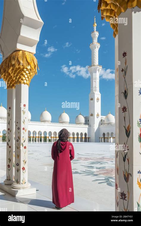 Unidentified Woman Visiting Grand Mosque In Abu Dhabi UAE Stock Photo