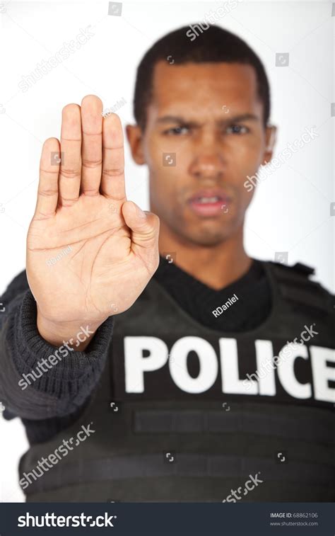 Police Officer Putting His Hand Up Stock Photo 68862106 Shutterstock
