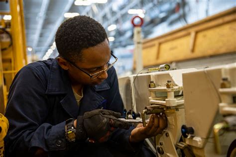 DVIDS Images USS George H W Bush CVN 77 Sailor Performs