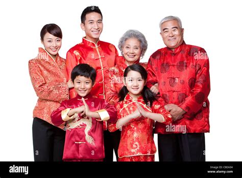 Family Dressed in Traditional Clothing Celebrating Chinese New Year ...