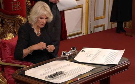 Queen Camilla signs her name into history at the emotional Accession ...