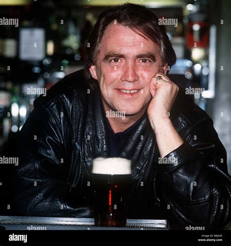 Bill Tarmey Actor Jack Duckworth of Coronation Street leaning on bar with pint of beer infront ...