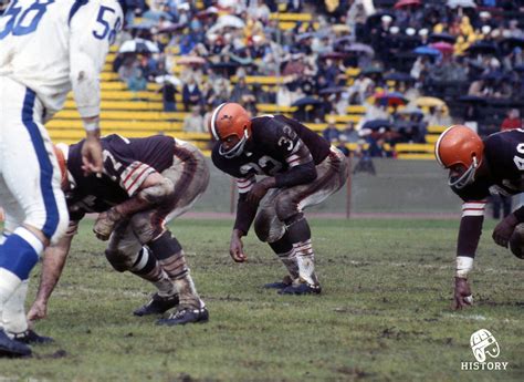 A Young Jim Brown Lines Up Behind The Browns Offensive Line During The