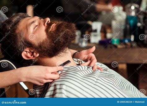 Barber Shaving A Bearded Man Close Up Beard Styling And Cut Vintage