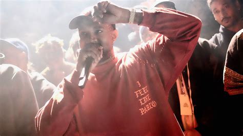 Kanye West Really Doesnt Care If You Hate His Fashion Lines Ripped Homeless Sweaters