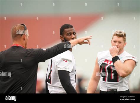 Atlanta Falcons Tight End Kyle Pitts Listens To A Coach With