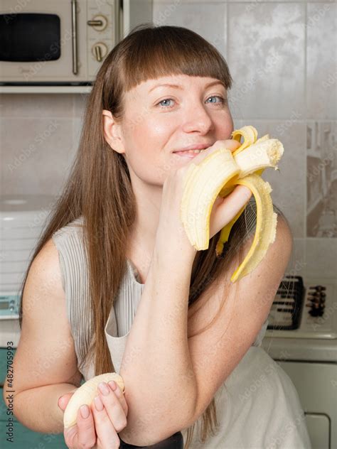 Beautiful Young Woman With Bananas In Kitchen Tropical Fruits Summer