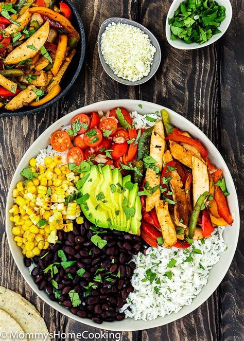 A Bowl Filled With Rice Black Beans Avocado And Other Vegetables