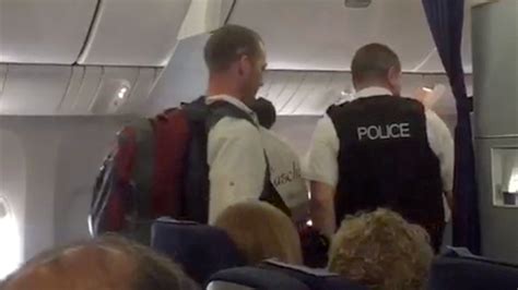 Passenger Films Man Being Escorted Off Plane In Belfast