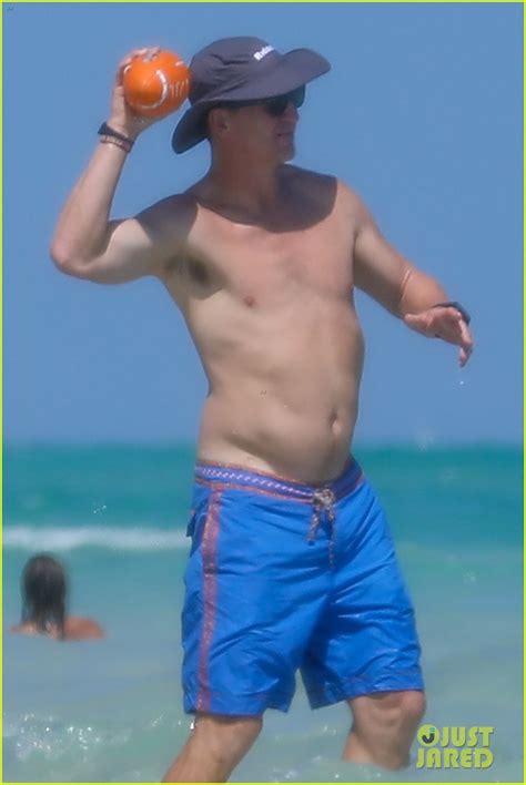 Peyton Manning Flaunts Ripped Abs While Shirtless At The Beach Photos