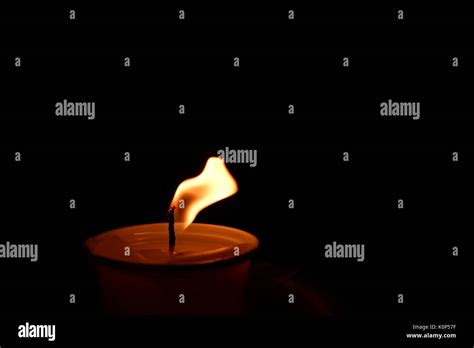 Flickering candles hi-res stock photography and images - Alamy