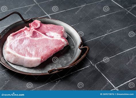 Raw Pork T Bone Chop Meat Steak Black Background Top View Stock Photo