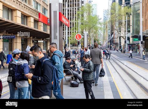 Sydney CBD light rail network, commuters wait on Bridge street station ...