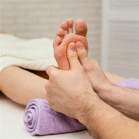 Free Photo Close Up Hands Massaging Sole