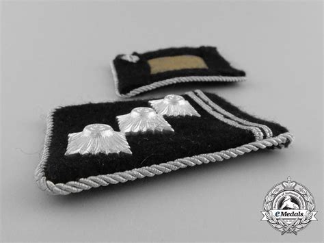 A Mint Set Of Waffen Ss Obersturmführer Collar Tabs Emedals