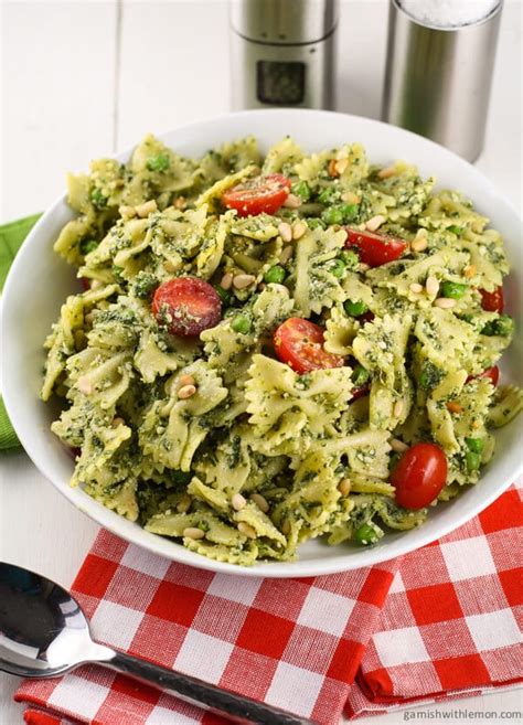 Pesto Pasta Salad With Peas Garnish With Lemon