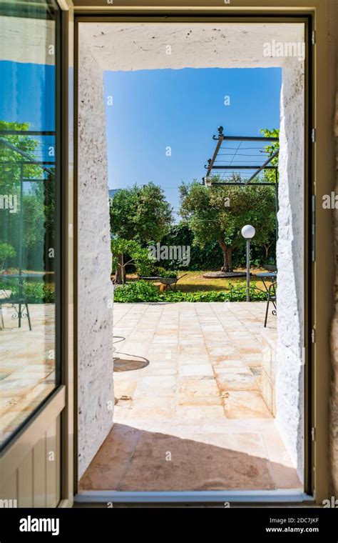 Olive Trees And Trulli Of The Itria Valley Puglia Stock Photo Alamy