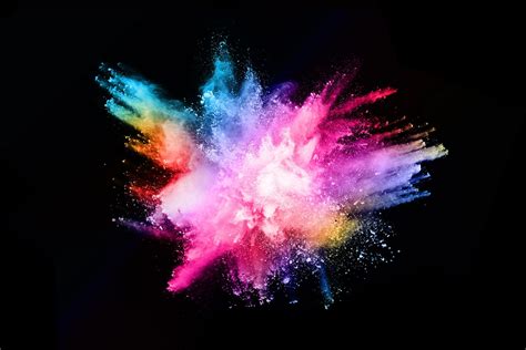 Abstract Colored Dust Explosion On A Black Background Abstract Powder