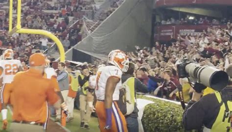 Watch South Carolina Fans Throw Bottles Trash At Clemson Players