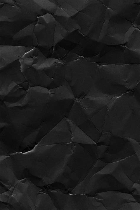 Download Mysterious Black Crumpled Paper Wallpaper | Wallpapers.com