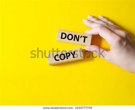 Dont Copy Symbol Wooden Blocks Words Stock Photo 2233777739 Shutterstock