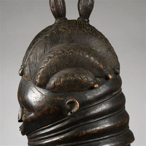 A woman’s mask from West Africa – Masks of the World