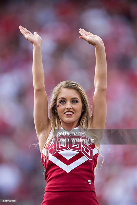 Cheerleaders of the Arkansas Razorbacks perform during a game against ...