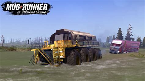 Spintires MudRunner Monster Truck Is Towing A Dump Truck Through A