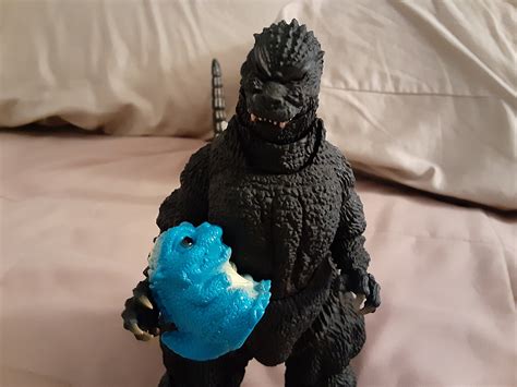 Godzilla Taking Good Care Of Baby Godzilla Junior By