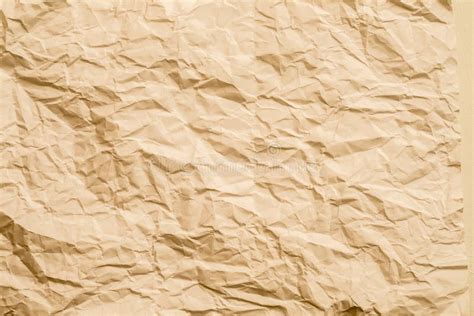 El Papel Arrugado Beige Machacó El Fondo De La Textura Imagen de