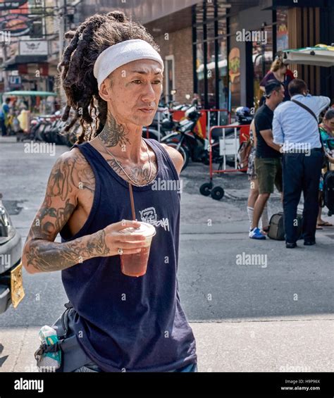 Man with a dreadlocks hairstyle. Thailand S. E. Asia Stock Photo - Alamy