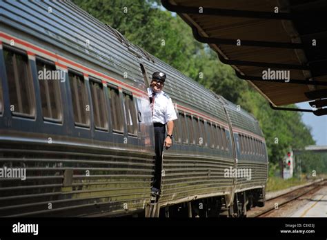 Conductor Of A Amtrak Silver Meteor Passenger Train At Deland Railroad